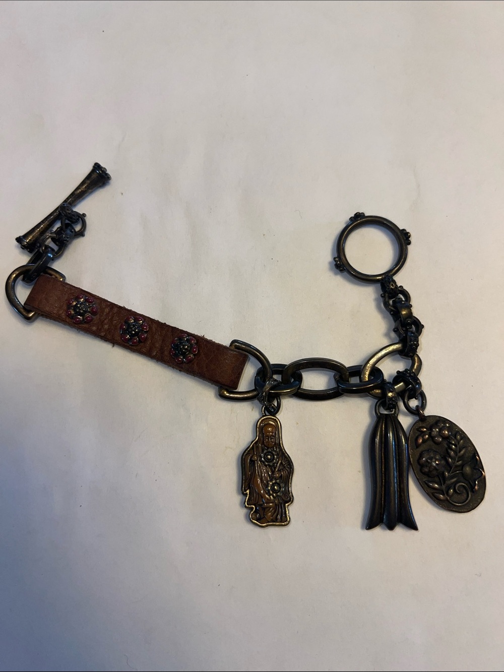 Lucky Brand bracelet, leather and bronze tone, metal, toggle closure, Buddha